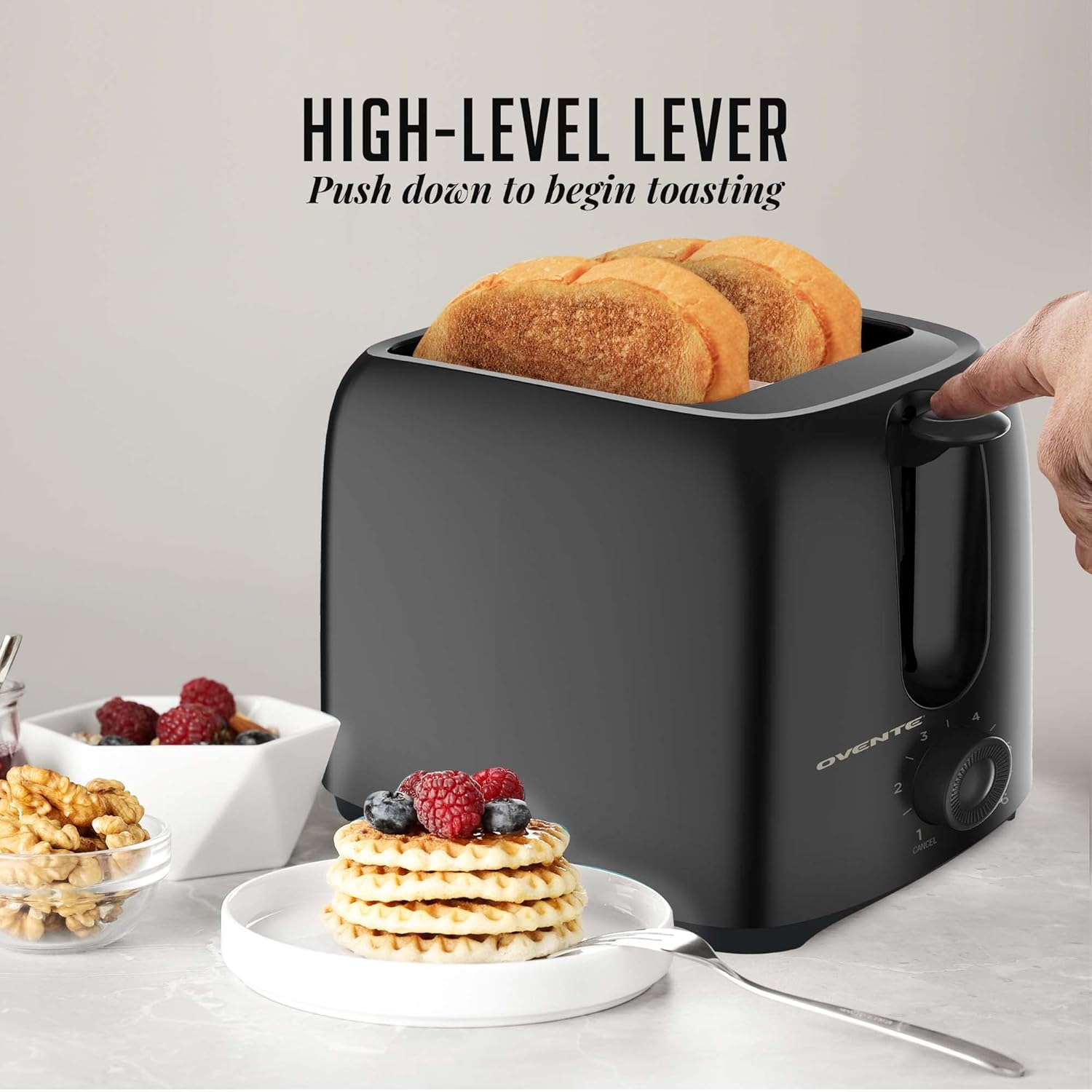 OVENTE Electric 2 Slice Toaster Machine with 6-Shade Browning Selector Setting, Compact Design and Removable Crumb Tray, 700W Power Perfect for Toasting Bread, Thin Bagels and Waffles, Black TP2210B - Image 4